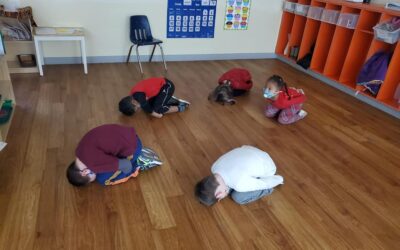 children practicing yoga