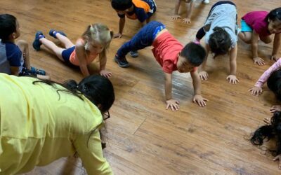 children practicing yoga